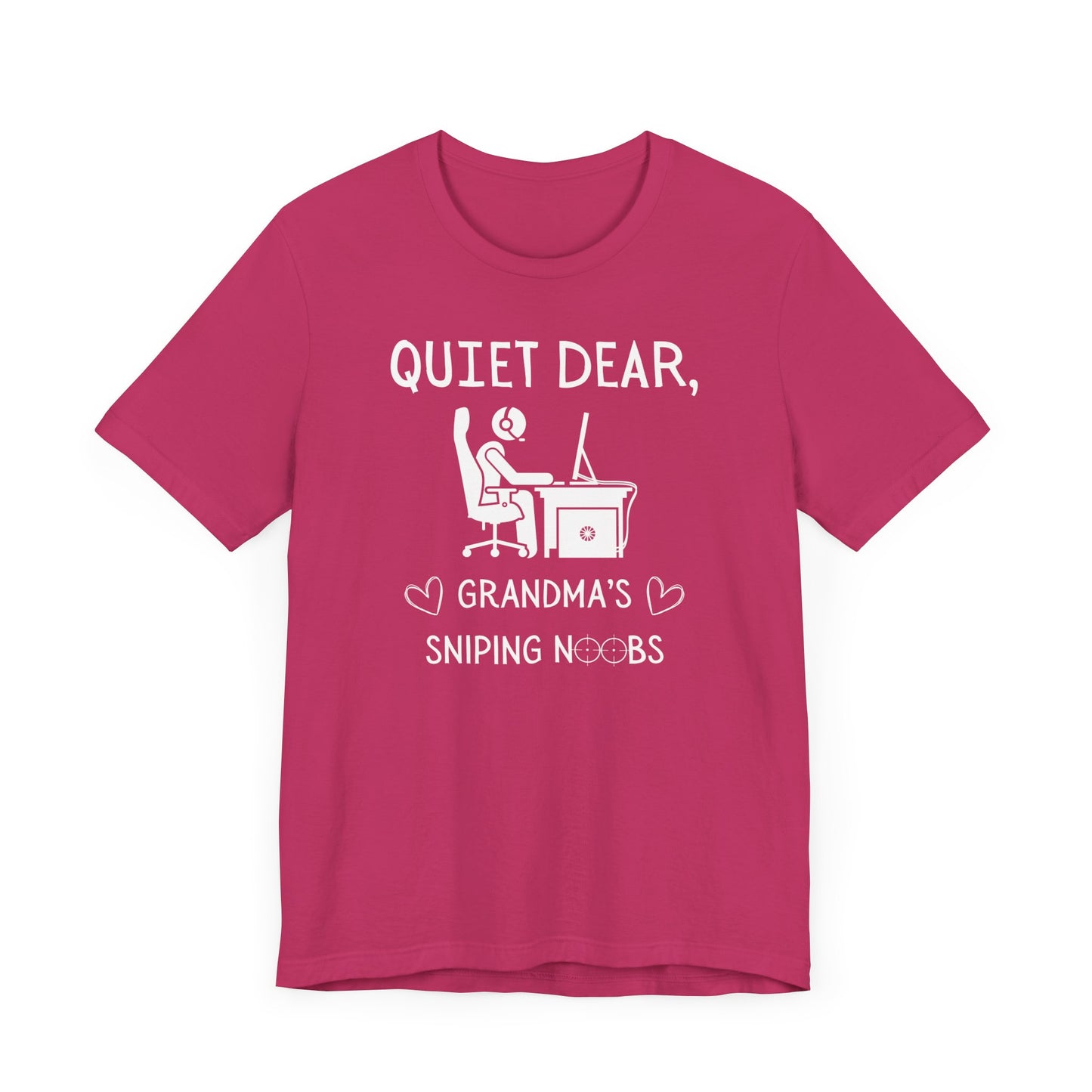 A flat image of a berry pink t-shirt that reads Quiet Dear, Grandma's Sniping Noobs in white text. The lower text is framed by two hearts, and the O's are in the shape of sniper scopes. In the center of the shirt is an image of a person at a desk with a gaming PC.