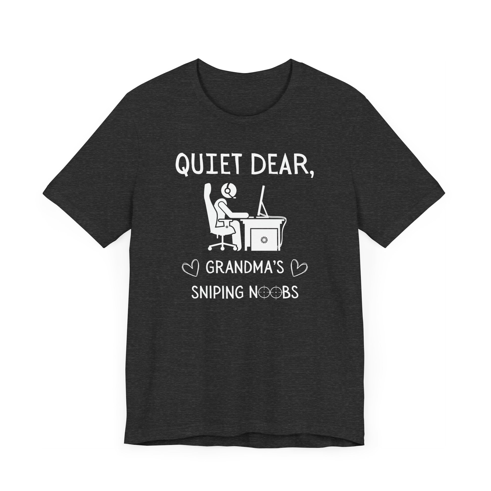 A flat image of a dark gray heather t-shirt that reads Quiet Dear, Grandma's Sniping Noobs in white text. The lower text is framed by two hearts, and the O's are in the shape of sniper scopes. In the center of the shirt is an image of a person at a desk with a gaming PC.