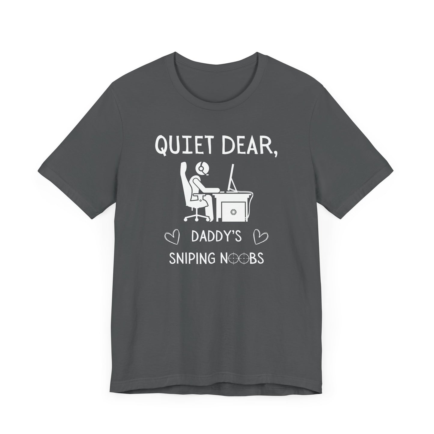 A flat image of a gray t-shirt that reads Quiet Dear, Daddy's Sniping Noobs in white text. The lower text is framed by two hearts, and the O's are in the shape of sniper scopes. In the center of the shirt is an image of a person at a desk with a gaming PC.