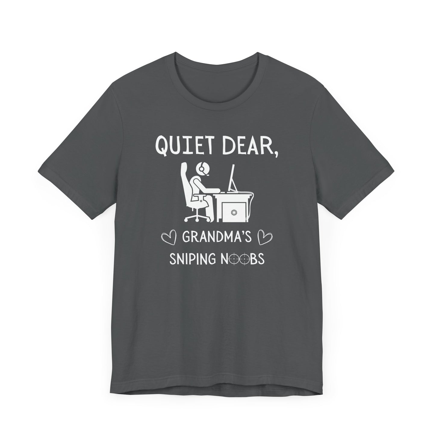 A flat image of a gray  t-shirt that reads Quiet Dear, Grandma's Sniping Noobs in white text. The lower text is framed by two hearts, and the O's are in the shape of sniper scopes. In the center of the shirt is an image of a person at a desk with a gaming PC.